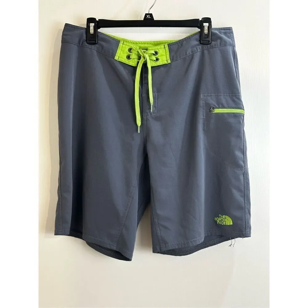 The North Face size 34 Men’s board shorts gray/ lime green